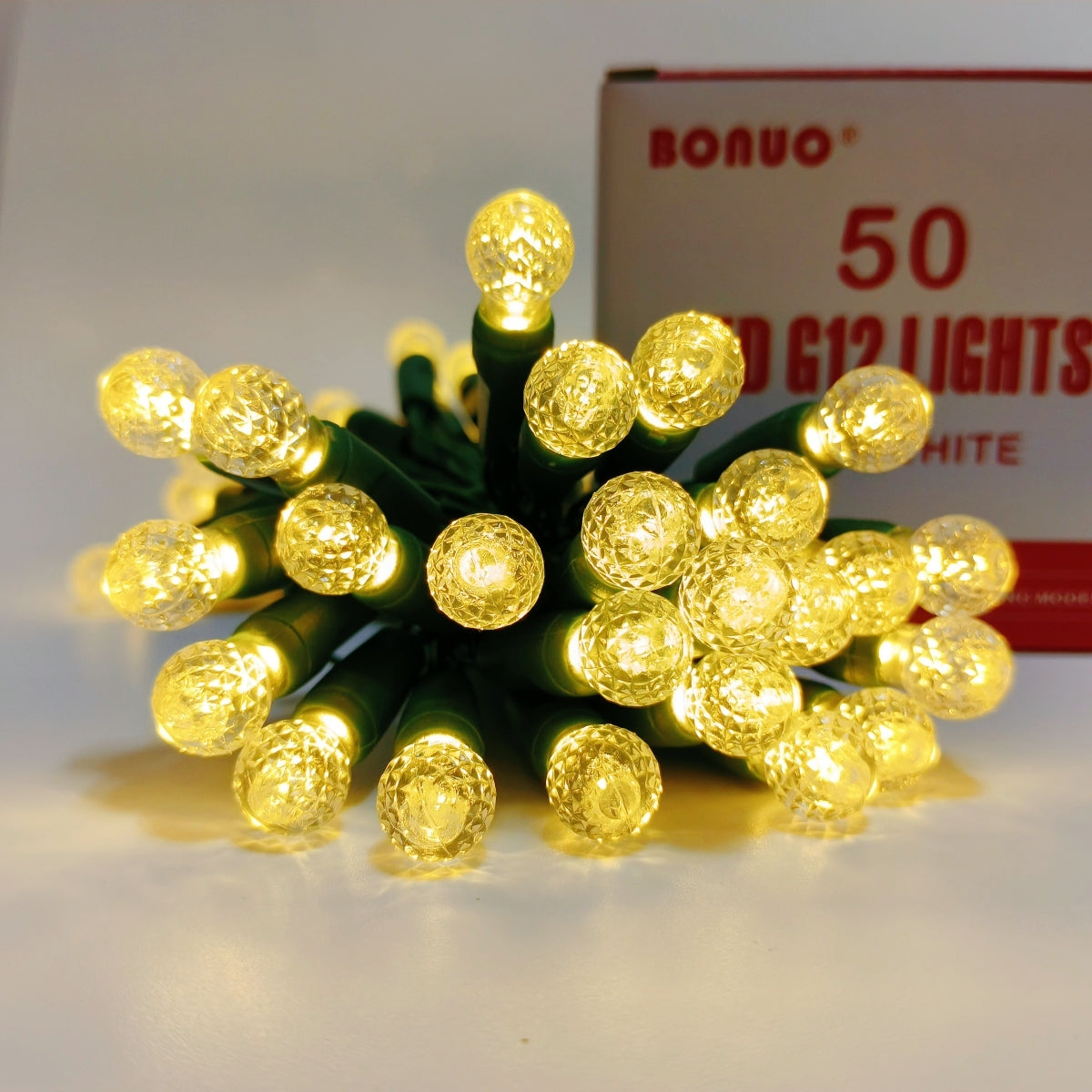 50 Count Warm White G12 Christmas Lights Battery Operated on Green Wire