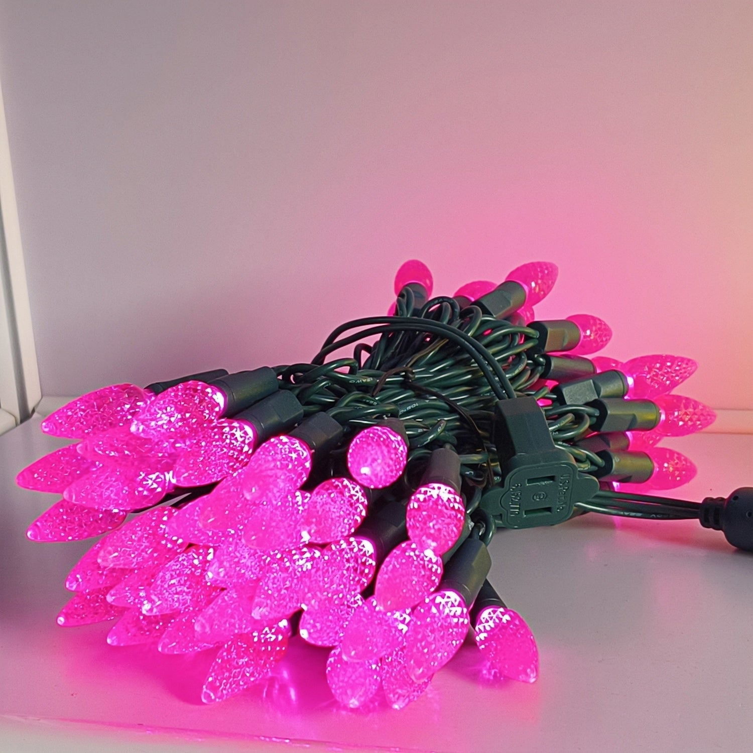 Commercial Grade Pink C6 LED Christmas Lights on Green Wire