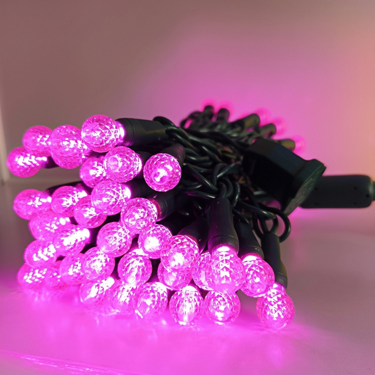 Commercial Grade Pink G12 LED Christmas Lights on Green Wire