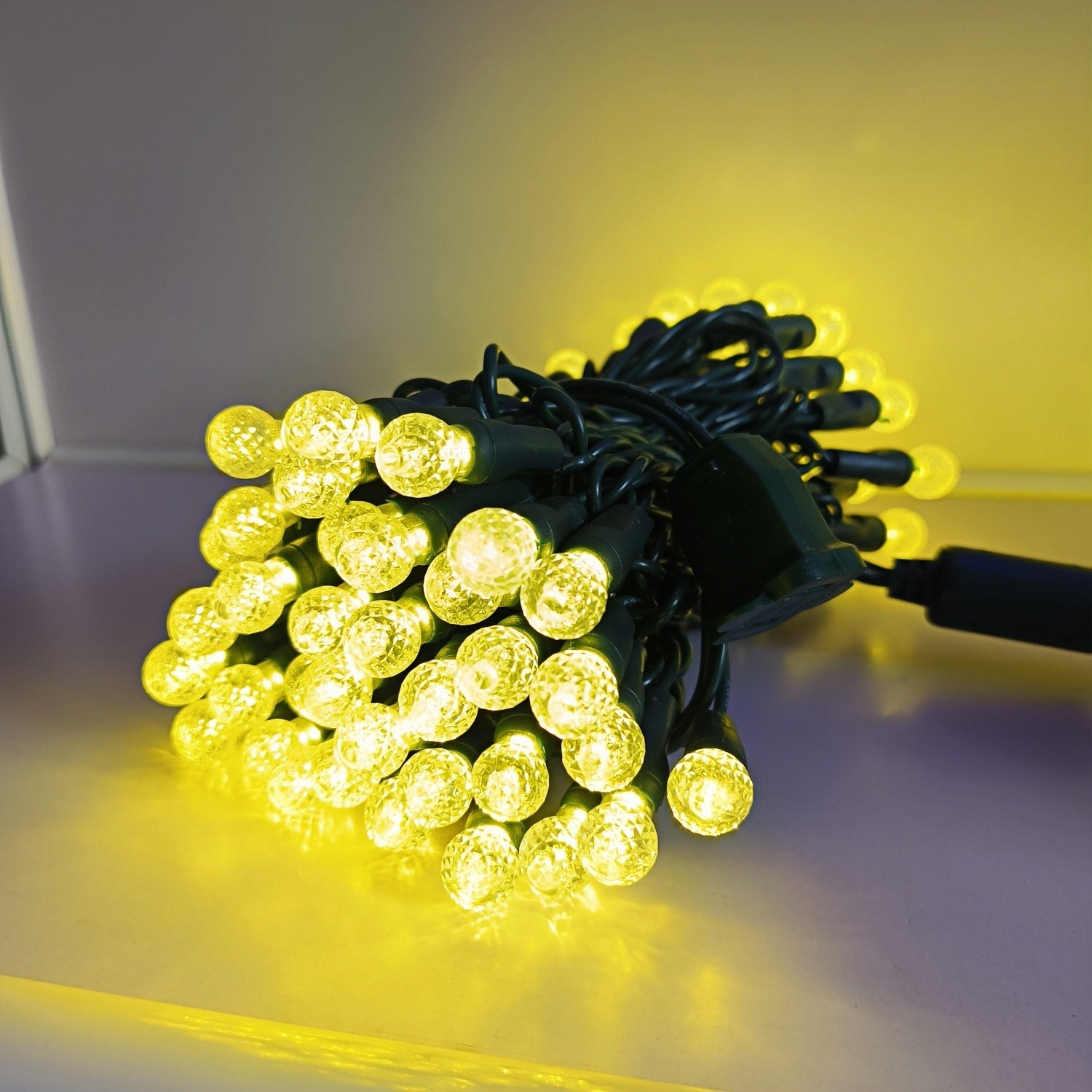 Commercial Grade Warm White G12 LED Christmas Lights on Green Wire