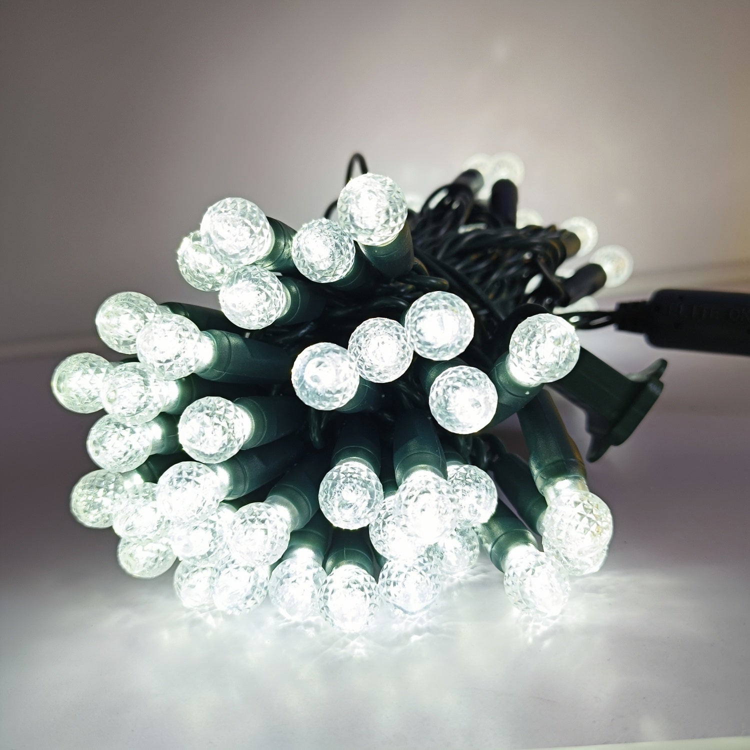 Commercial Grade Pure White G12 LED Christmas Lights on Green Wire
