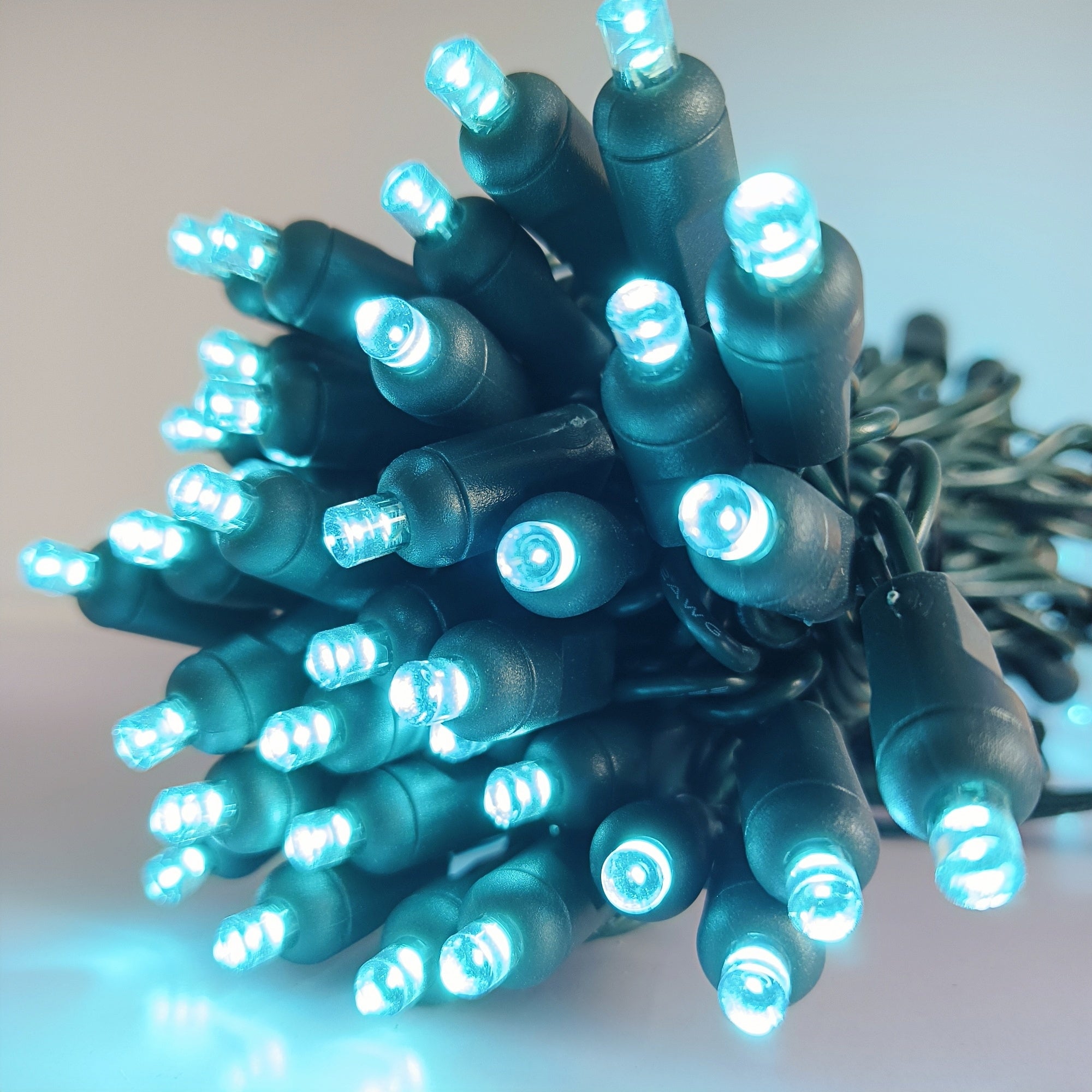 Commercial Grade Teal 5mm Wide Angle LED Christmas Lights on Green Wire